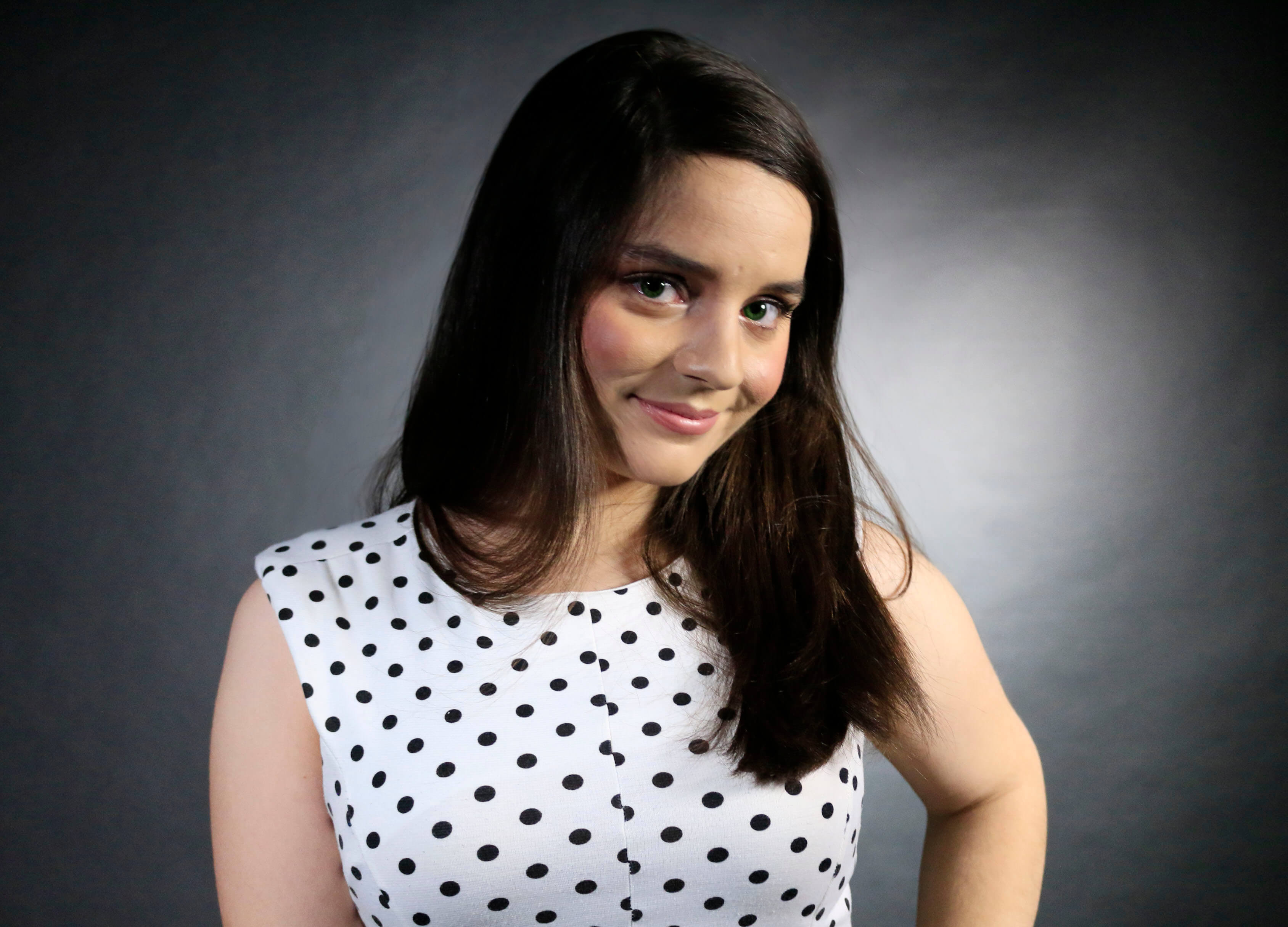 Photo of Rachel, a young brunette smiling